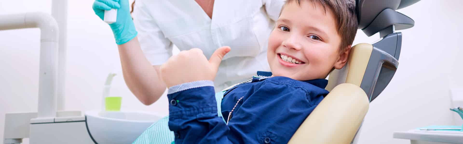 Kids in Dental Chair — Dental Care in Mittagong, NSW